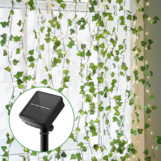 LUZ SOLAR CÁLIDA TIPO CORTINA DE HOJAS